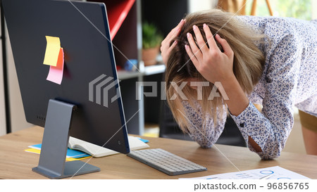 Employee suffers because of mistake and problems at work in office. 96856765