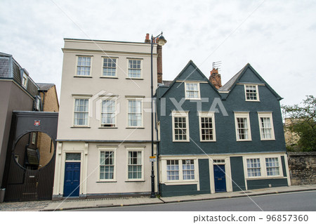 The streets of Oxford Colorful buildings lined up along the road 96857360