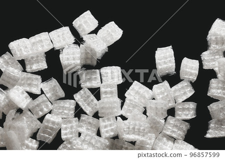 Close up picture of recycled plastic film chips, selective focus. 96857599