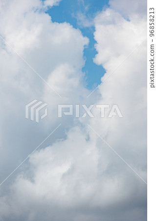 white cumulus clouds against a blue sky, beautiful large thunderclouds in the sky white cumulus clouds against a blue sky, beautiful large thunderclouds in the sky 96858213