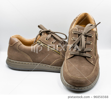 Brown man nubuck shoes with shoelace on white. 96858388