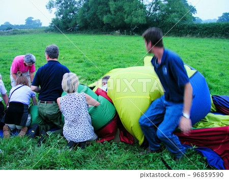 Hot air balloon landing Deflate the balloon and fold the envelope 96859590