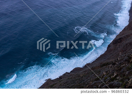 ocean surf waves at sunset view from above ocean surf waves at sunset view from above 96860332