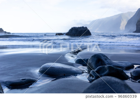 black sand beach of Madeira view on mountains black sand beach of Madeira view on mountains 96860339