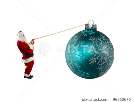 Santa claus pulls a rope to move a big christmas ball Santa claus pulls a rope to move a big christmas ball 96860670