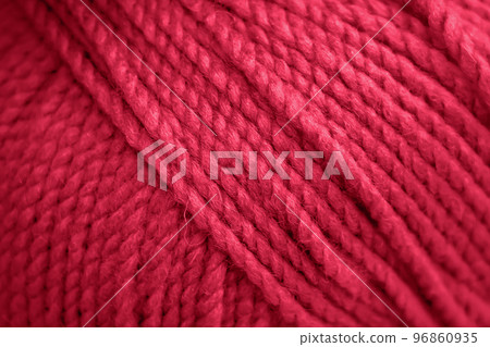 Texture of pink fluffy woolen threads for knitting. Color of the year 2023 - Viva Magenta Texture of pink fluffy woolen threads for knitting. Color of the year 2023 - Viva Magenta 96860935