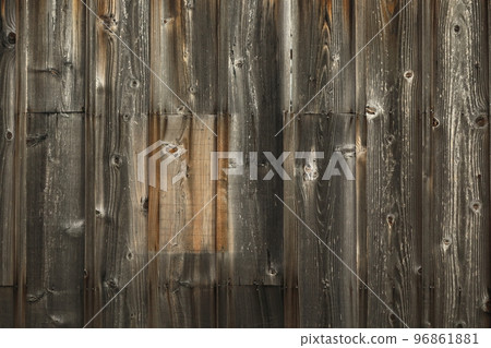 Weathered and faded board fence 96861881