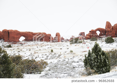 Colorado Plateau in early spring Arches National Park North Window and Turret Arch in a snowstorm Colorado Plateau in early spring Arches National Park North Window and Turret Arch in a snowstorm 96862688