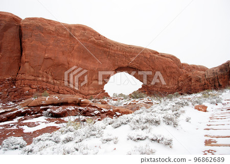 Colorado Plateau in early spring Arches National Park North Window in a snowstorm Colorado Plateau in early spring Arches National Park North Window in a snowstorm 96862689