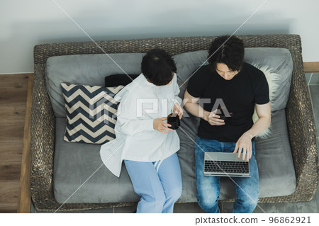 A couple to relax on the sofa A couple to relax on the sofa 96862921