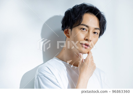 Man in white t-shirt Man in white t-shirt 96863360