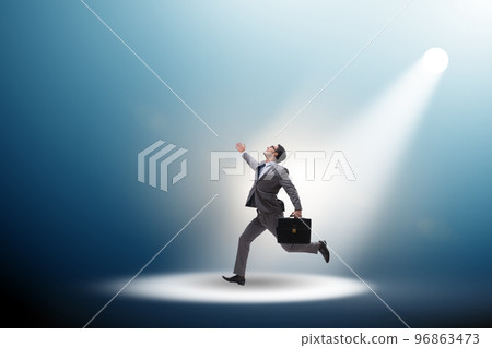 Business people under the spotlight 96863473