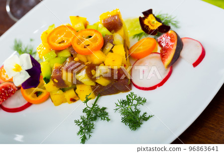 Tasty tartar with fresh tuna, mango, avocado Tasty tartar with fresh tuna, mango, avocado 96863641