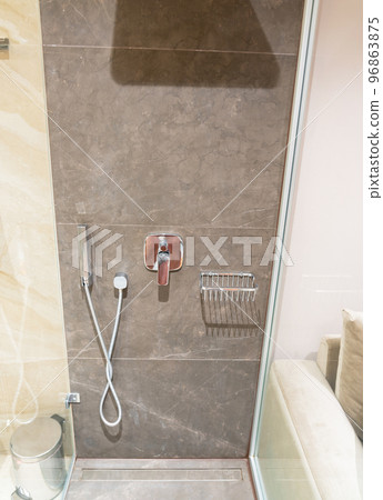 Modern glass shower room interior in modern hotel Modern glass shower room interior in modern hotel 96863875