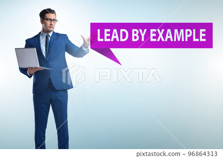 Businessman in lead by example concept Businessman in lead by example concept 96864313
