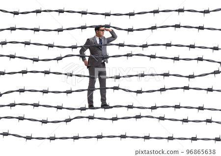 Businessman in barbed wire concept Businessman in barbed wire concept 96865638