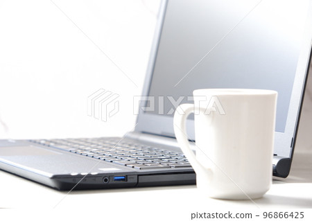 desk work with laptop and coffee 96866425