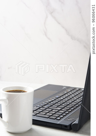 desk work with laptop and coffee 96866431