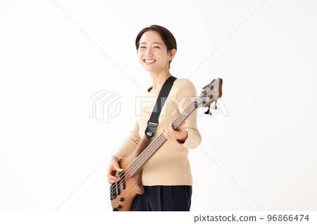 Woman playing bass White background Woman playing bass White background 96866474