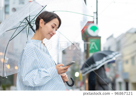 Bus stop woman Bus stop woman 96867121