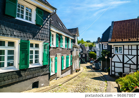 Historic half-timbered and slate houses in Solingen-Grafrath - North Rhine-Westphalia, Germany 96867807