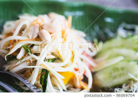Papaya salad at a seaside cafe Papaya salad at a seaside cafe 96869704