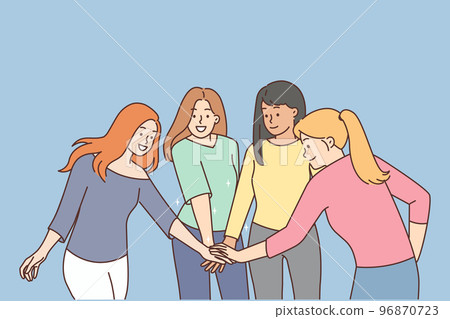 Smiling girls join hands show unity  96870723
