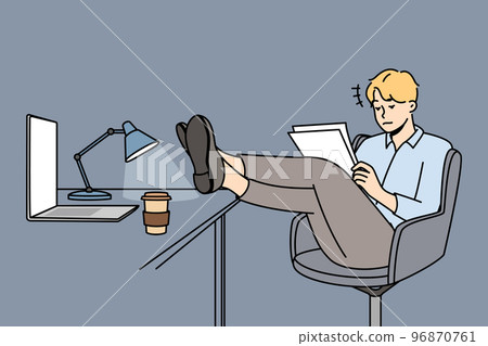 Employee is in office overhours due to deadline. 96870761