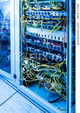 server inside data center with ethernet cables connected to data switch server inside data center with ethernet cables connected to data switch 96873706