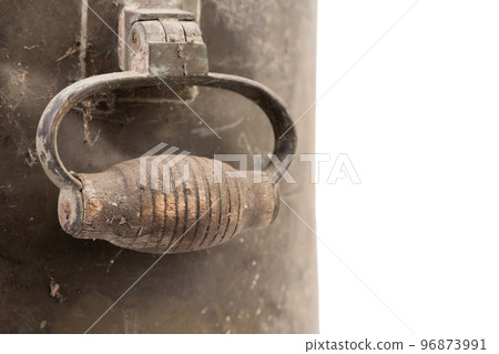 Wood handle of old dirty Russian samovar in a cobweb. 96873991