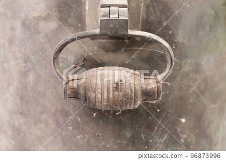 Wood handle of old dirty Russian samovar in a cobweb. 96873996