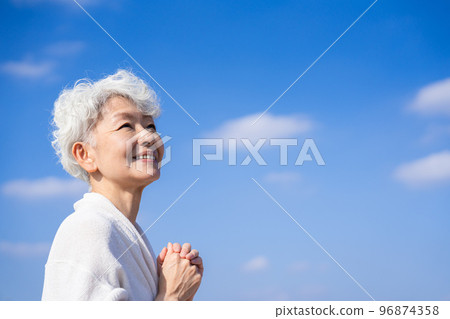 Senior woman looking to the future Senior woman looking to the future 96874358