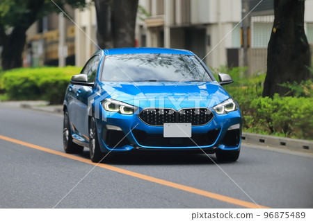 Image of a sports car running in the city 96875489