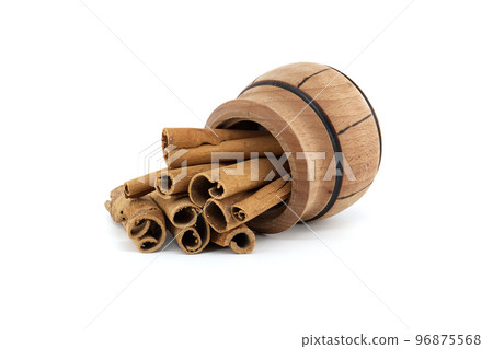 Cinnamon sticks isolated on white background Cinnamon sticks isolated on white background 96875568