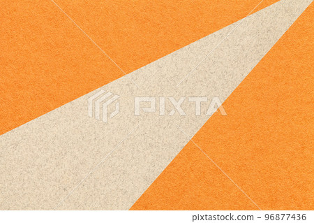 Texture of old craft orange color paper background with beige line, macro. Vintage abstract ginger cardboard Texture of old craft orange color paper background with beige line, macro. Vintage abstract ginger cardboard 96877436
