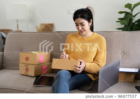 Startup small business entrepreneur online SME or freelance woman working at home concept, Young Asian small business owner at home office, online marketing packaging and delivery, SME concept Startup small business entrepreneur online SME or freelance woman working at home concept, Young Asian small business owner at home office, online marketing packaging and delivery, SME concept 96877557