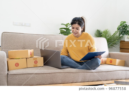 Startup small business entrepreneur online SME or freelance woman working at home concept, Young Asian small business owner at home office, online marketing packaging and delivery, SME concept Startup small business entrepreneur online SME or freelance woman working at home concept, Young Asian small business owner at home office, online marketing packaging and delivery, SME concept 96877558