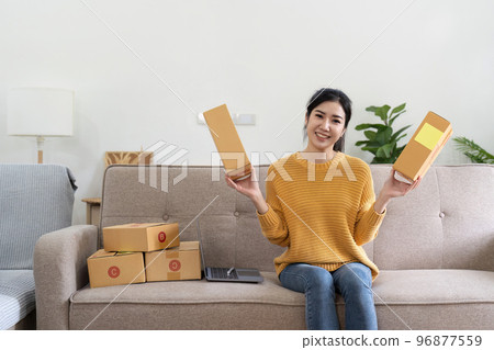 Startup small business entrepreneur online SME or freelance woman working at home concept, Young Asian small business owner at home office, online marketing packaging and delivery, SME concept Startup small business entrepreneur online SME or freelance woman working at home concept, Young Asian small business owner at home office, online marketing packaging and delivery, SME concept 96877559