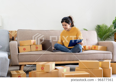 Startup small business entrepreneur online SME or freelance woman working at home concept, Young Asian small business owner at home office, online marketing packaging and delivery, SME concept Startup small business entrepreneur online SME or freelance woman working at home concept, Young Asian small business owner at home office, online marketing packaging and delivery, SME concept 96877561