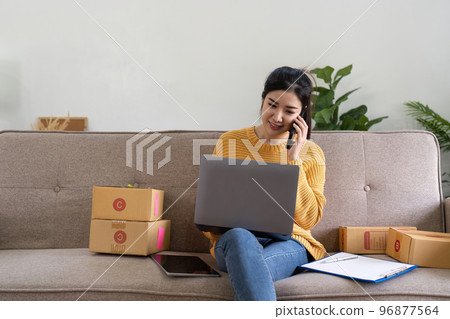 Startup small business entrepreneur online SME or freelance woman working at home concept, Young Asian small business owner at home office, online marketing packaging and delivery, SME concept Startup small business entrepreneur online SME or freelance woman working at home concept, Young Asian small business owner at home office, online marketing packaging and delivery, SME concept 96877564