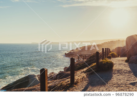 Encounter Bay coastline viewed from Granite Island at sunset Encounter Bay coastline viewed from Granite Island at sunset 96878290