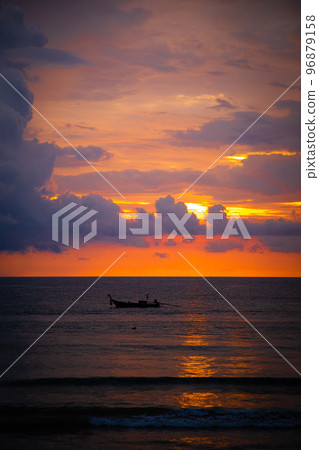 Beautiful beach sunset in koh Lanta, Krabi, Thailand Beautiful beach sunset in koh Lanta, Krabi, Thailand 96879158