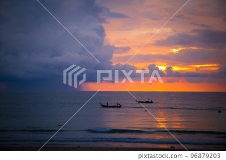 Beautiful beach sunset in koh Lanta, Krabi, Thailand Beautiful beach sunset in koh Lanta, Krabi, Thailand 96879203