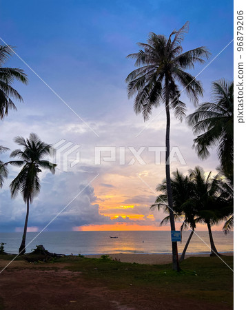 Beautiful beach sunset in koh Lanta, Krabi, Thailand Beautiful beach sunset in koh Lanta, Krabi, Thailand 96879206