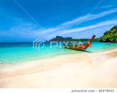 Long Tail boat in Monkey Beach in koh Phi Phi Don island, in Krabi, Thailand Long Tail boat in Monkey Beach in koh Phi Phi Don island, in Krabi, Thailand 96879695