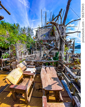 Old wooden pirate boat on the beach in Koh Phayam, Ranong, Thailand Old wooden pirate boat on the beach in Koh Phayam, Ranong, Thailand 96879943