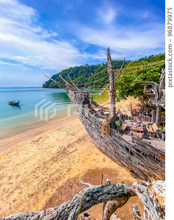 Old wooden pirate boat on the beach in Koh Phayam, Ranong, Thailand Old wooden pirate boat on the beach in Koh Phayam, Ranong, Thailand 96879975