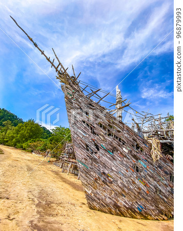 Old wooden pirate boat on the beach in Koh Phayam, Ranong, Thailand Old wooden pirate boat on the beach in Koh Phayam, Ranong, Thailand 96879993