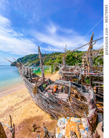 Old wooden pirate boat on the beach in Koh Phayam, Ranong, Thailand Old wooden pirate boat on the beach in Koh Phayam, Ranong, Thailand 96879995