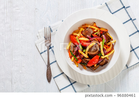 Lomo saltado, fried beef, french fries, veggies Lomo saltado, fried beef, french fries, veggies 96880461